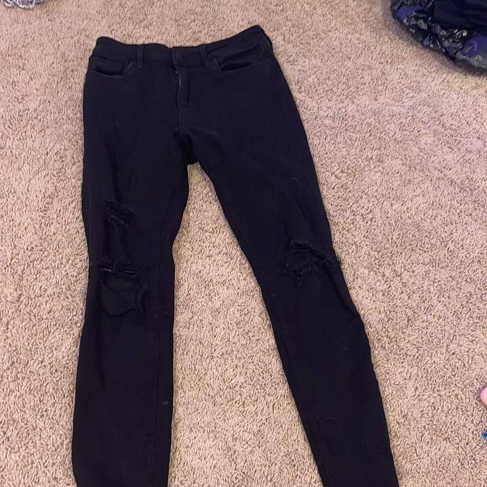 black ripped jeans